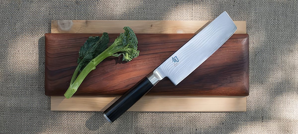 Nakiri is a Japanese vegetable knife with a straight edge and rectangular blade, ideal for precise chopping and slicing.