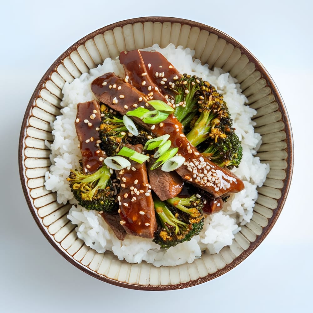 Beef and broccoli stir-fry in asian bowl Beef and broccoli stir-fry in asian bowl