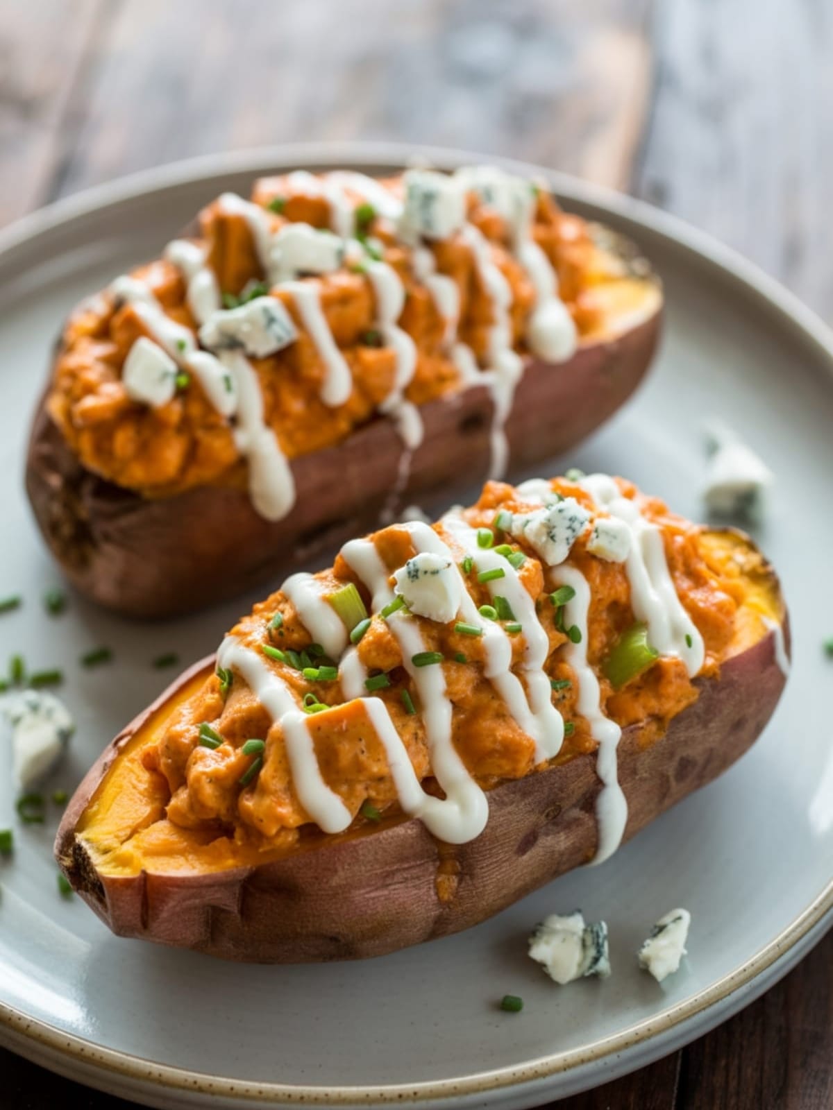 Buffalo Chicken Stuffed Sweet Potatoes - The Perfect Spicy-Sweet Comfort Meal